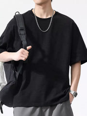 Black relaxed fit cotton t-shirt for men with crew neck and short sleeves.