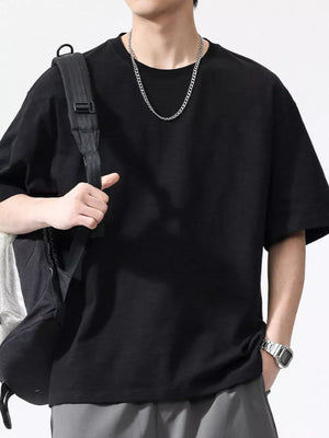 Black relaxed fit cotton t-shirt for men with crew neck and short sleeves.