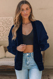 Navy textured open-front acrylic knit cardigan with waffle knit detail and relaxed fit.