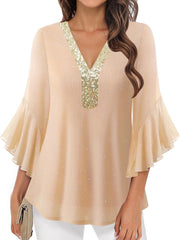 Apricot sequin v-neck blouse with flutter sleeves and glitter detail.