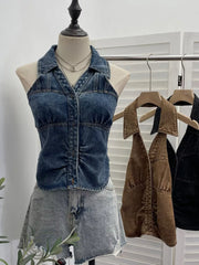 Blue denim halter top with collar and gathered front detail.