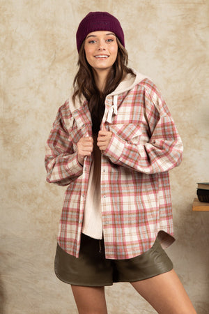 Cozy plaid shacket with sherpa hood in Dusty Pink, buttoned front, casual styling.