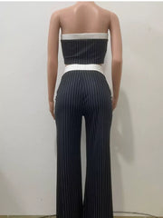 Black pinstripe strapless crop top and wide-leg pants set with white trim