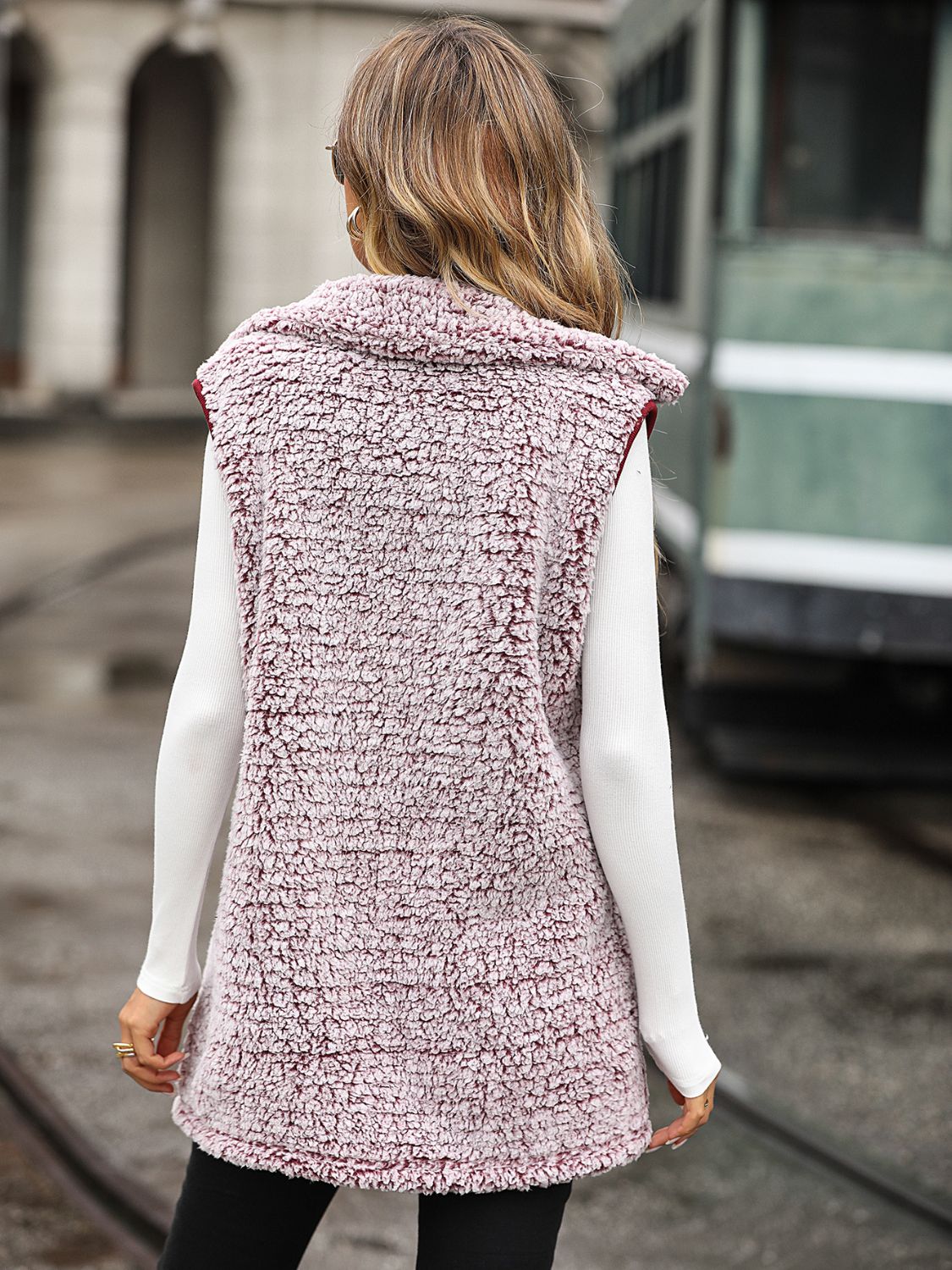 Teddy sherpa utility vest in dusty pink with a shawl collar, shown from the back.