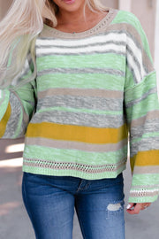 Open-shoulder striped knit pullover sweater in gum leaf with boatneck and crochet detail.