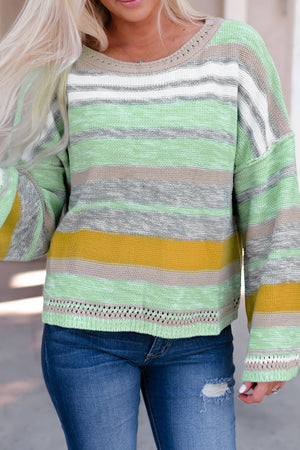 Open-shoulder striped knit pullover sweater in gum leaf with boatneck and crochet detail.