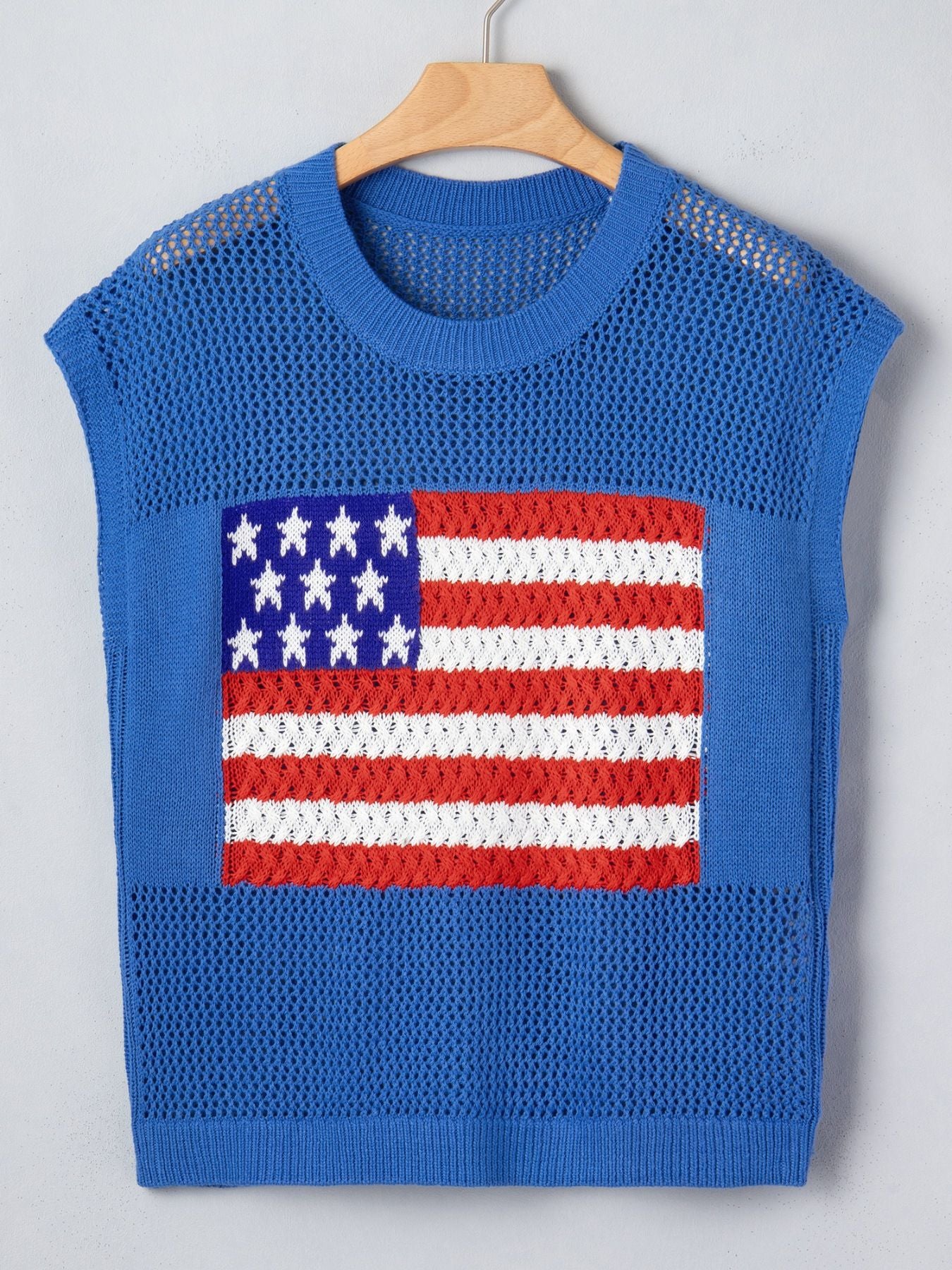 Blue knit sleeveless crew neck top with an American flag graphic and open knit details.