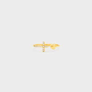 Gold ring with open heart and diamond-accented cross detail