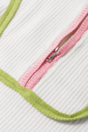 Colorblock ribbed quarter-zip pullover in white with pink and green trim detail