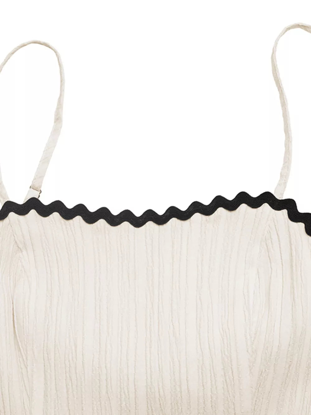 Cream cami dress with black scalloped contrast trim and textured fabric.
