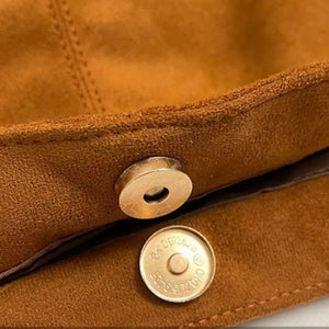 Ochre suede slouchy shoulder bag detail with magnetic snap closure