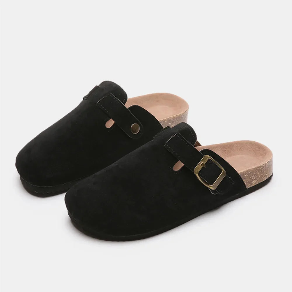 Black suede clog slides with adjustable buckle and cork sole