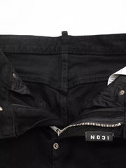 Black cotton slim fit jeans with zip fly and button closure.