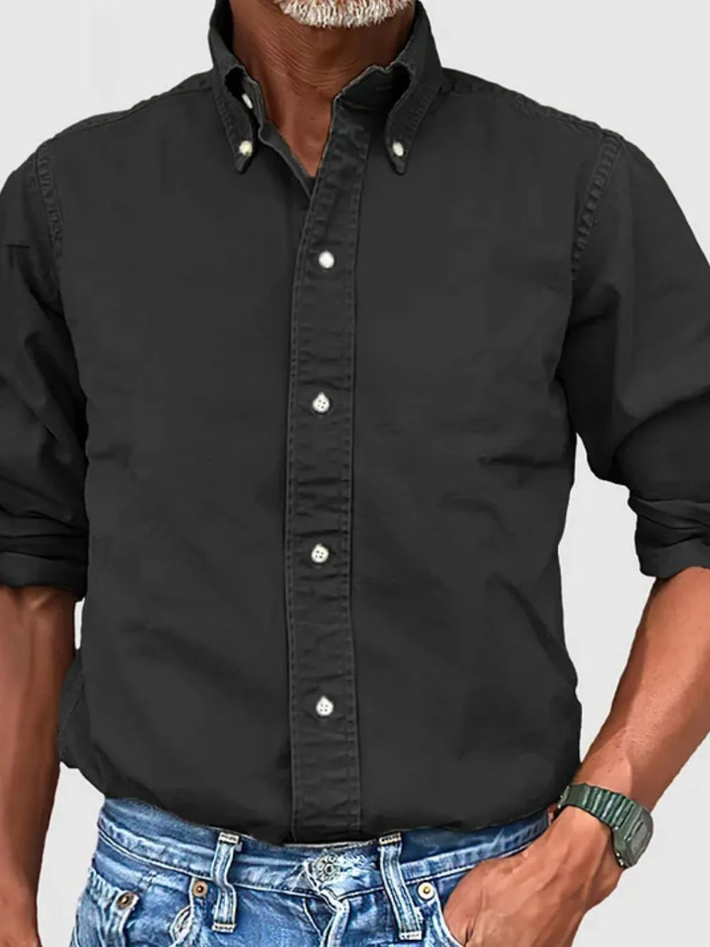 Black Oxford button-down shirt with relaxed fit and button-down collar.
