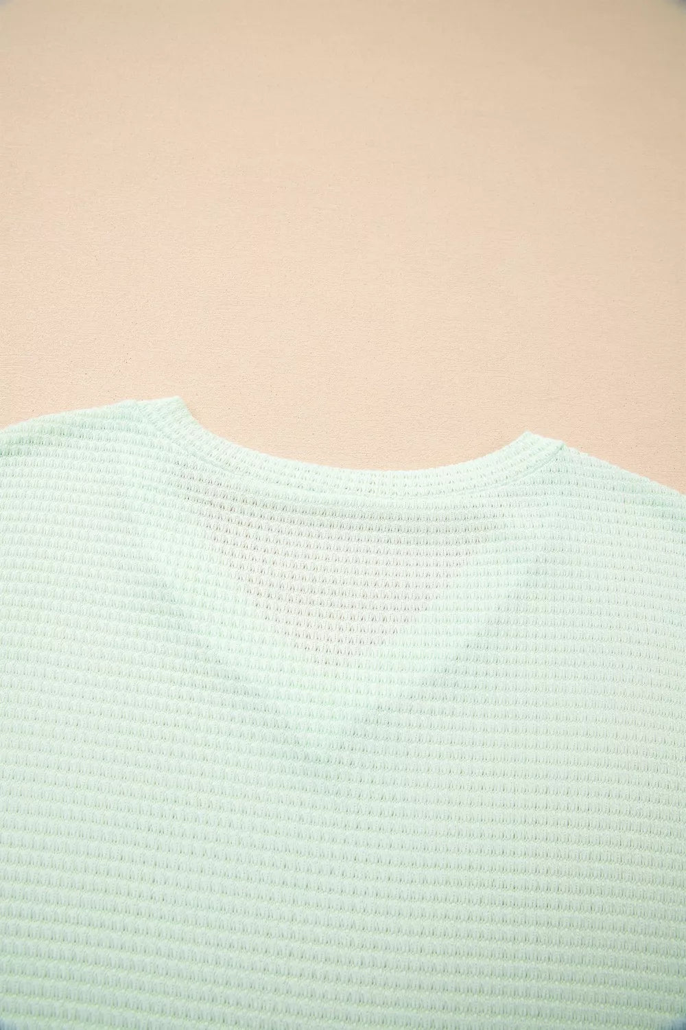 Light green waffle knit maternity t-shirt with V-neck detail