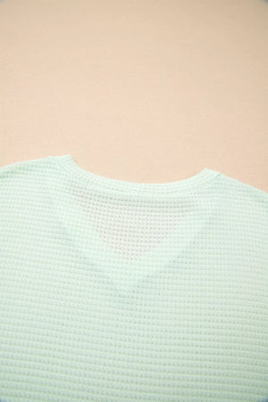 Light green waffle knit maternity t-shirt with V-neck detail