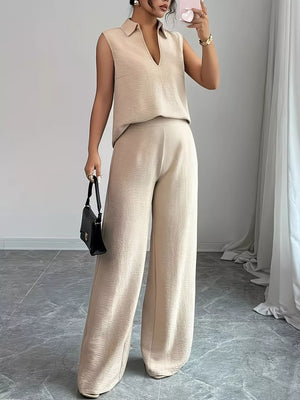 Beige sleeveless collared V-neck top and textured wide-leg pants set.