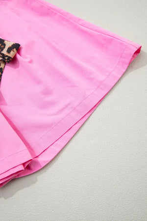 Pink chino shorts with leopard print belt detail