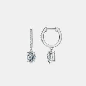 Silver pavé hoop and oval moissanite drop earrings with diamond accents.