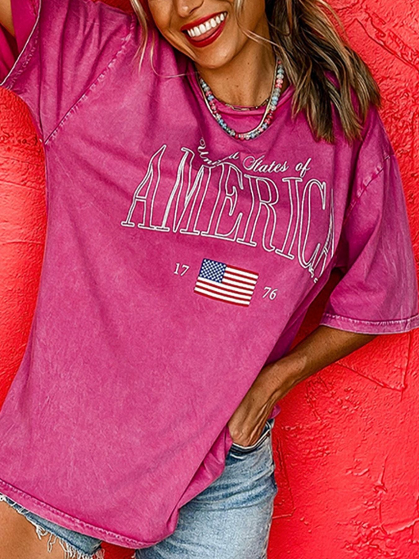 Pink cotton t-shirt with "States of America" graphic and US flag detail