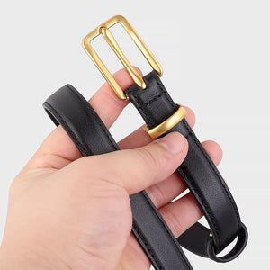 Black cowhide leather skinny belt with gold buckle and keeper loop.