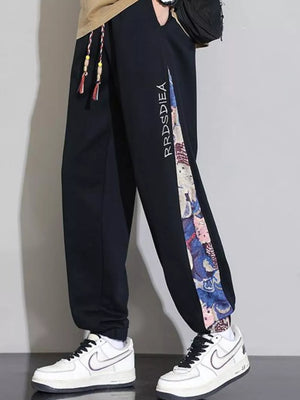Men's Plus Size Bear Print Sweatpants in Tan, close-up detail