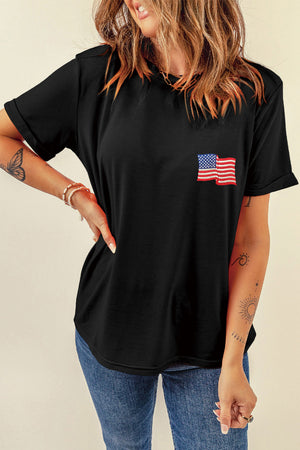 Black t-shirt with rolled sleeves and embroidered American flag detail on chest.