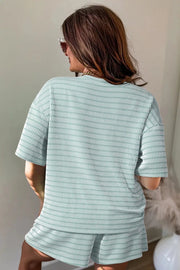 Sage striped two-piece short set with textured fabric and drawstring detail.