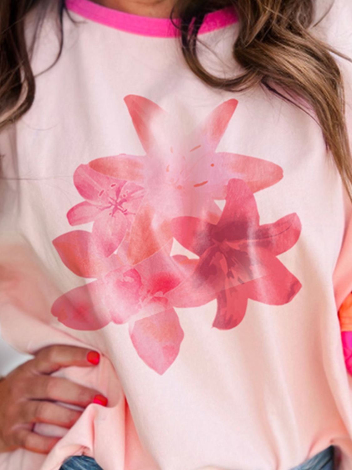 Colorblock floral t-shirt in watermelon pink with a crew neck and short sleeves, featuring a large pink floral print.