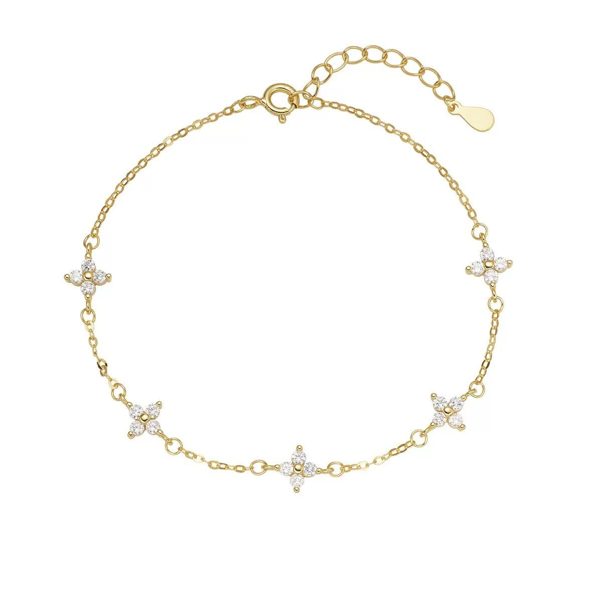 Gold delicate bracelet with four-leaf clover charms and crystal accents