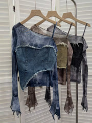 Edgy asymmetrical denim layered t-shirt in blue with sheer butterfly print sleeves and frayed hem.