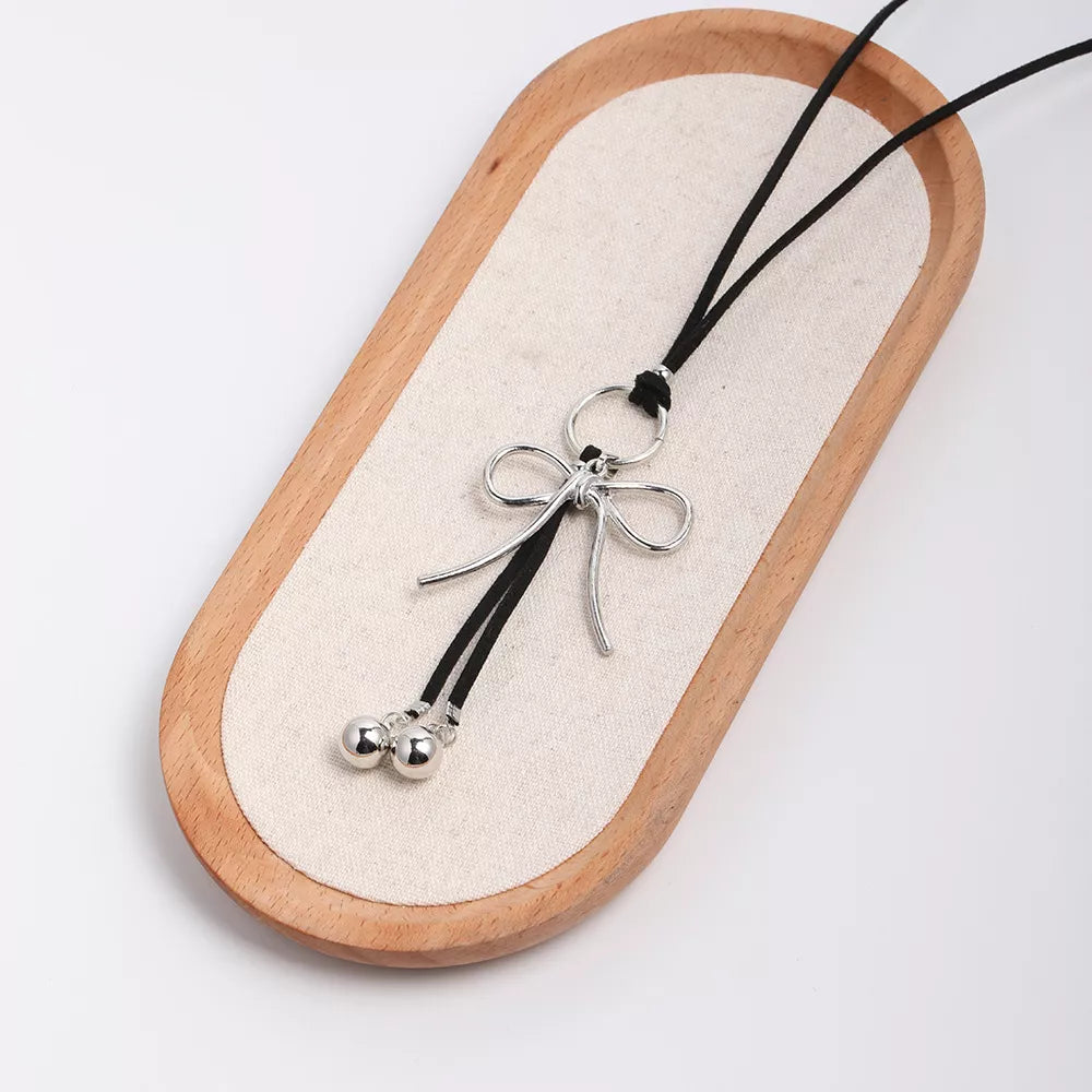 Elegant Bow Pendant Faux Leather Necklace in Silver, fit detail