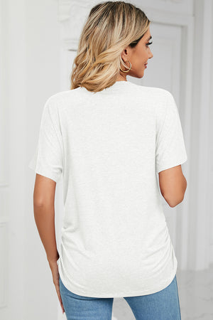 White v-neck tee with short sleeves and side ruching detail.