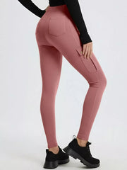 Rose pink active maternity pants with cargo pockets and back pockets.