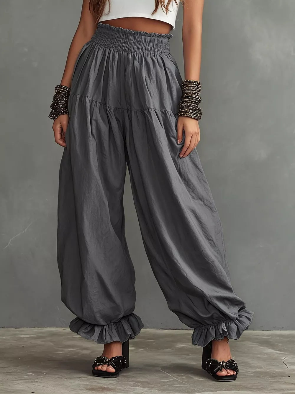 Full Size Smocked Ruffle Hem Wide Leg Pants in Mustard, editorial view