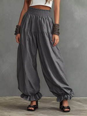 Full Size Smocked Ruffle Hem Wide Leg Pants in Mustard, editorial view