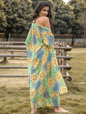 Bohemian print duster and palazzo set in gum leaf green with yellow and blue geometric pattern.