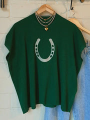 Green ribbed knit sweater with a silver horseshoe graphic and short sleeves.