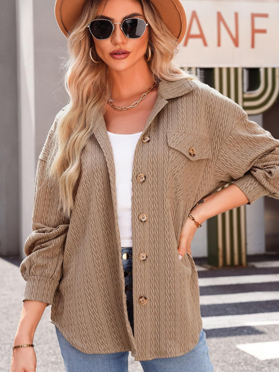 Textured oversized button-down shacket in Camel with button details and chest pockets.