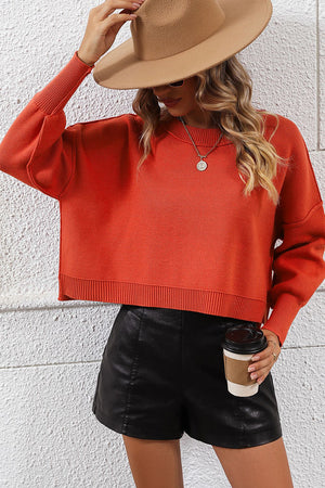 Neon cropped dolman sleeve knit sweater in orange-red, beige, teal, yellow-green, white, or black.