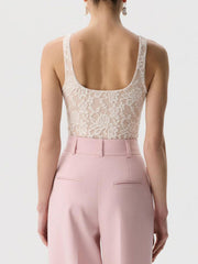 Beige sheer lace tank top with floral pattern and scoop neckline.