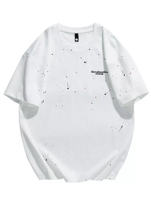 White cotton t-shirt with black and red paint splatter detail and graphic text.