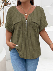 Moss ribbed knit henley with zip neck, chest pockets, and short sleeves.