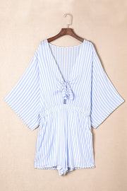 Light blue and white striped tie-front kimono jumpsuit with cinched waist and wide sleeves.