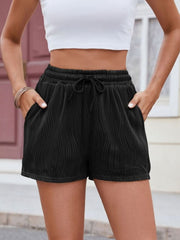 Black textured wave drawstring shorts with pockets