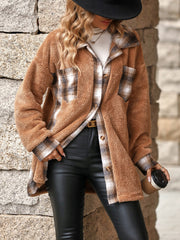 Brown teddy shacket with plaid collar and cuffs, button front, and chest pockets.