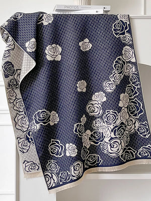 Navy blue scarf with white roses and diamond pattern, fringed edges