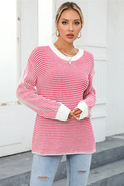 Nautical stripe ribbed knit crewneck sweater in deep rose with white trim.