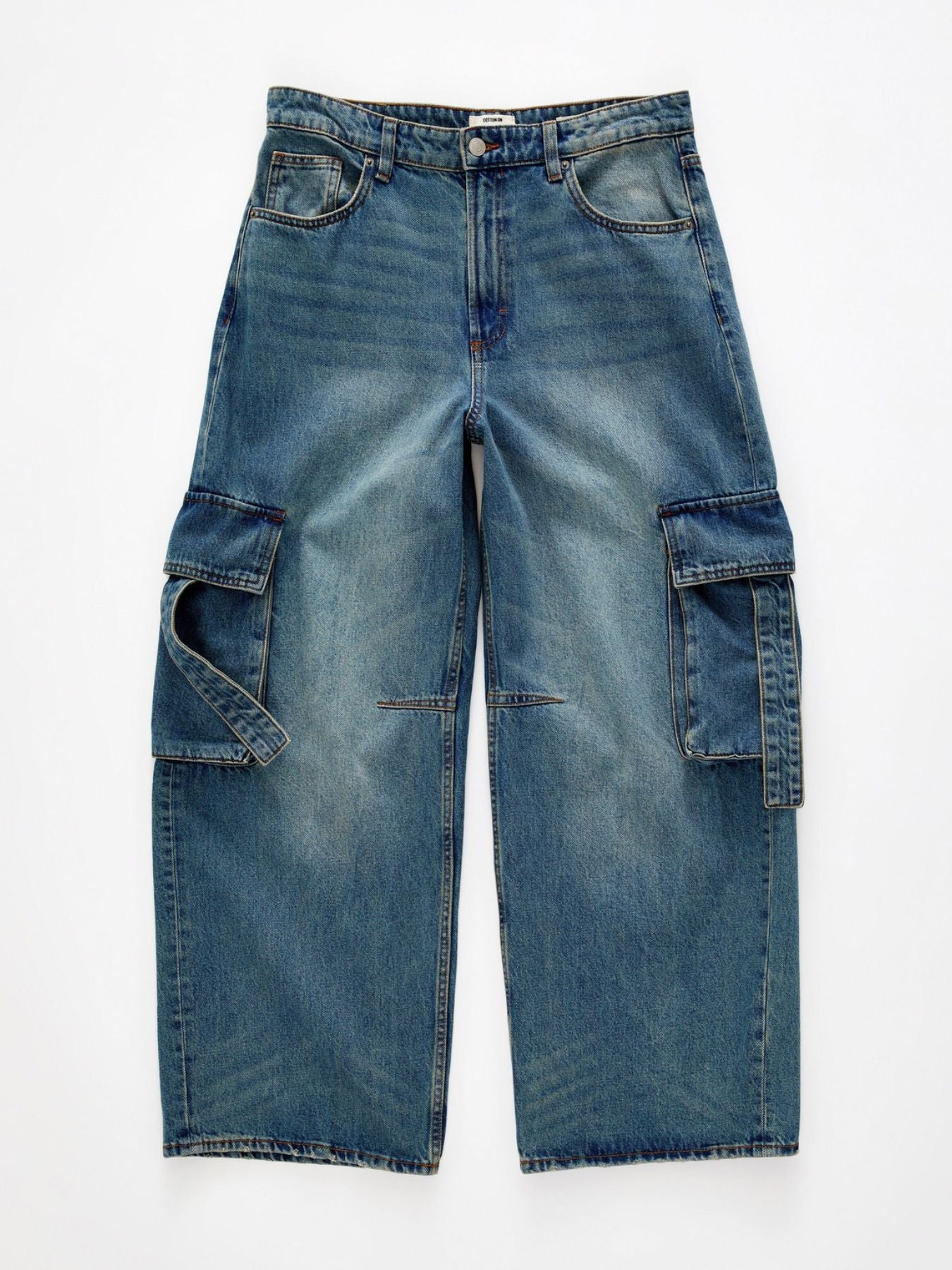 Relaxed fit light blue wash maternity cargo jeans with vintage charm and ankle length.