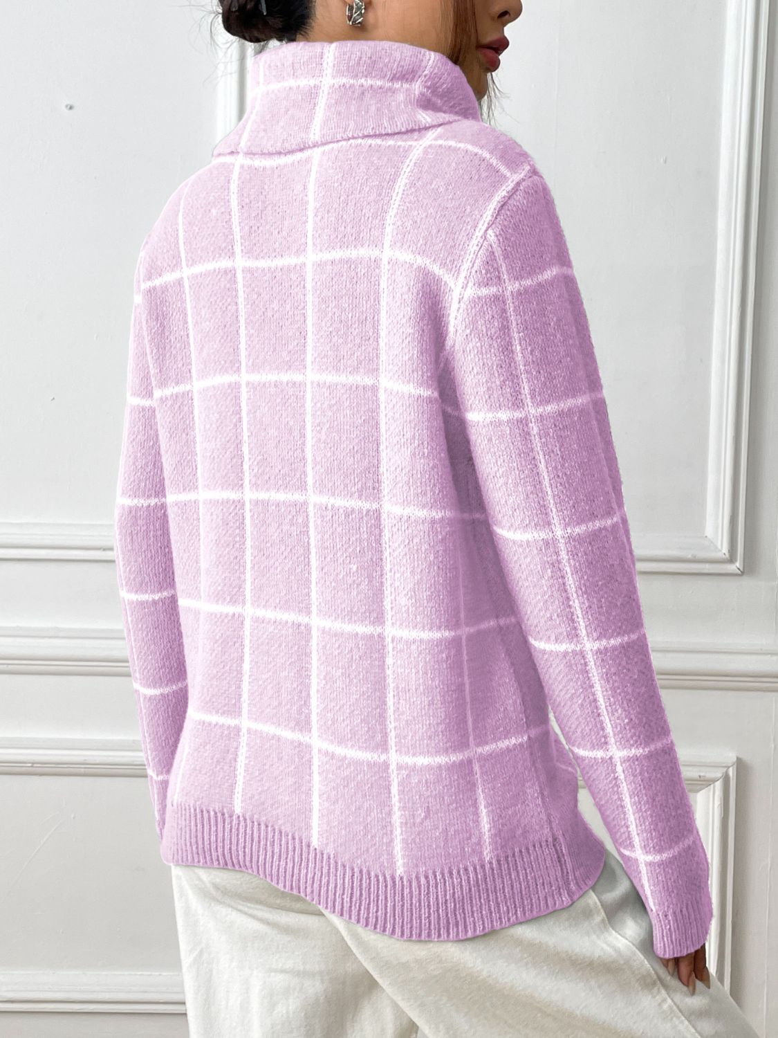 Pink purple grid-patterned turtleneck knit pullover sweater with ribbed hem and cuffs.